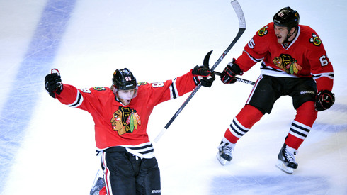 Jun 8, 2013; Chicago, IL, USA; Chicago Blackhawks right wing Patrick Kane (88) celebrates with center Andrew Shaw (65) after scoring the game-winning goal during the second overtime in game five of the Western Conference 